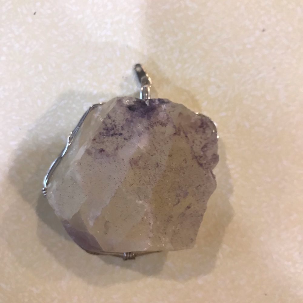 Wire wrapped crystal pendant. Made by hand.